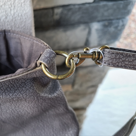 This brown purse is new and never used. It was a gift so there's no tags. - Picture 6 of 7